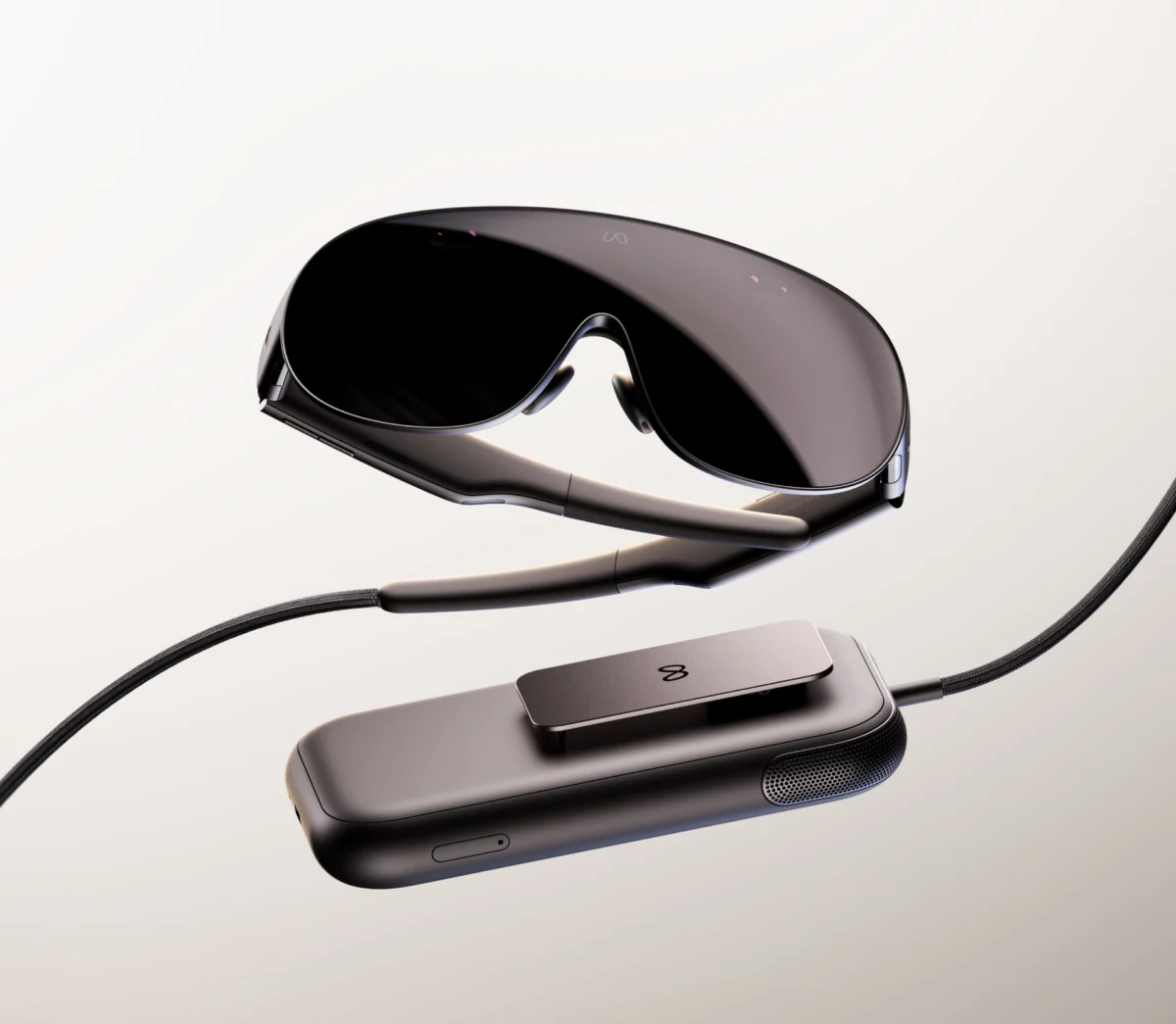 Rendu des lunettes Meta VR, une visière enveloppante sombre avec des branches fines, avec un câble tressé allant jusqu'à une rondelle à clipser noir mat